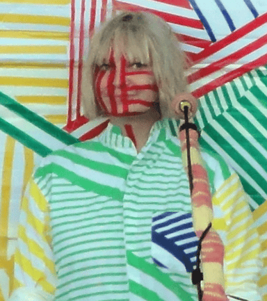 What is the name of Sia's 2021 album that accompanies her feature film?