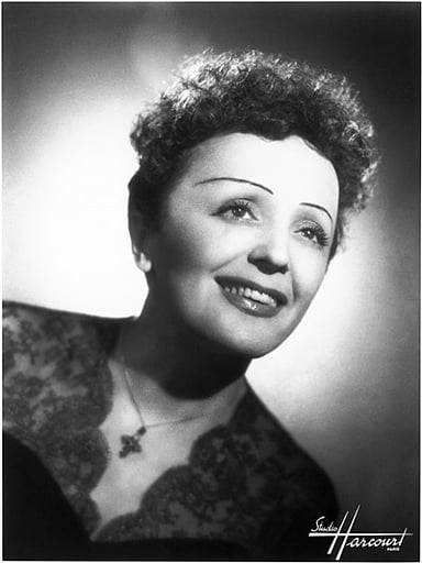 What was Theme of Édith Piaf's songs?