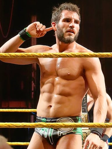 What year did Johnny Gargano become the first ever NXT Triple Crown Champion?