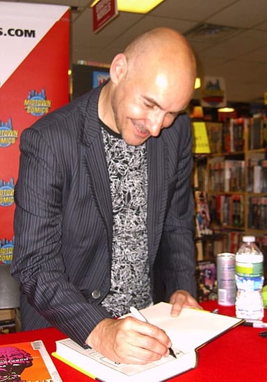 What gender does Grant Morrison identify as?