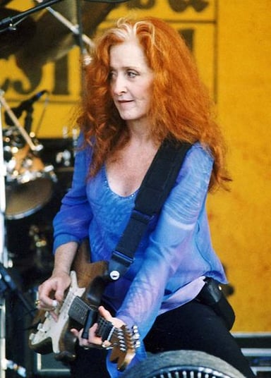 Which of these artists has Bonnie Raitt NOT collaborated with?