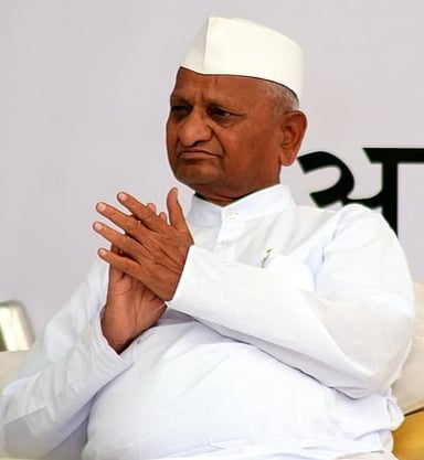 What social tactics is Anna Hazare notable for using besides grassroots organizing?