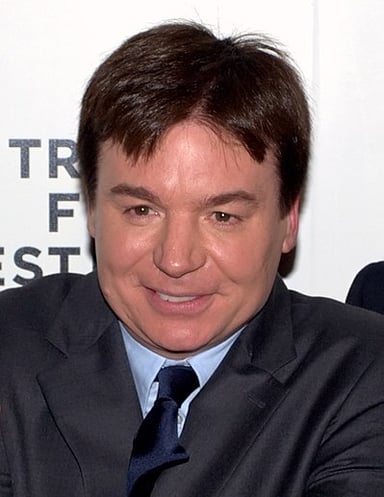 What award institution honored Mike Myers with an Officer title for comedy?