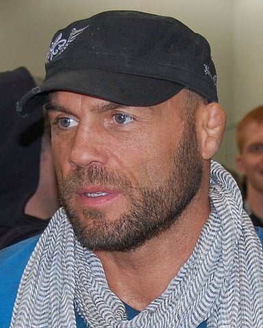 In which UFC event did Randy Couture first become a champion?