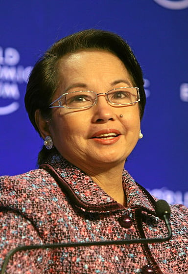 What is Gloria Macapagal Arroyo's religion or worldview?