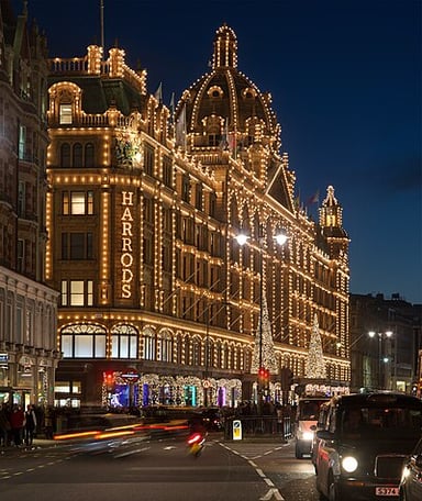 What color are the Harrods shopping bags?
