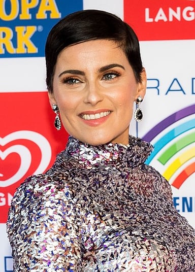 What is the name of Nelly Furtado's own record label?