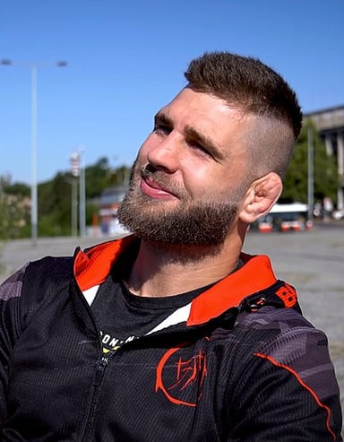 What is Jiří's professional MMA win rate, approximately?