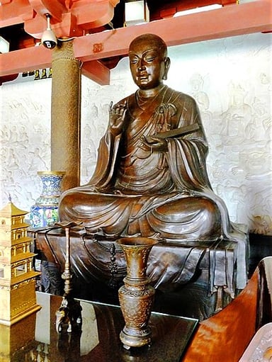 At what age was Xuanzang ordained as a novice monk?