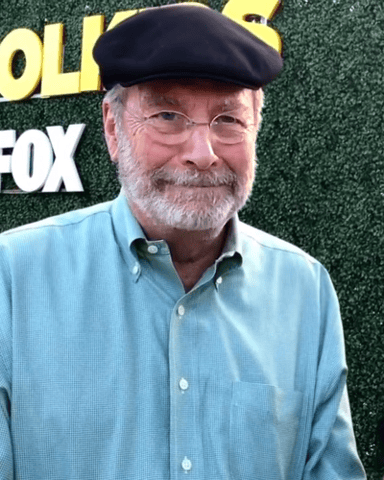 Which character did Martin Mull play in "Roseanne"?