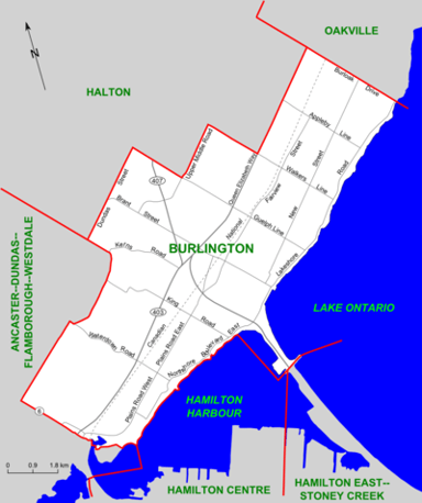 Which two cities does Burlington lie approximately halfway between?