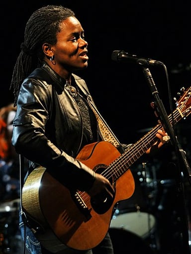 What genre is Tracy Chapman primarily associated with?