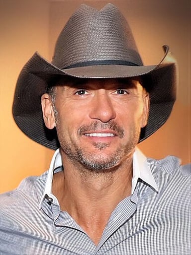 How many singles has Tim McGraw produced from his albums?
