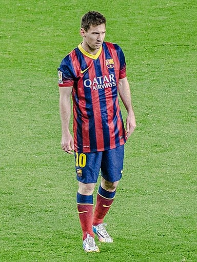 Which number did [url class="tippy_vc" href="#1878"]Lionel Messi[/url] have while playing for FC Barcelona?