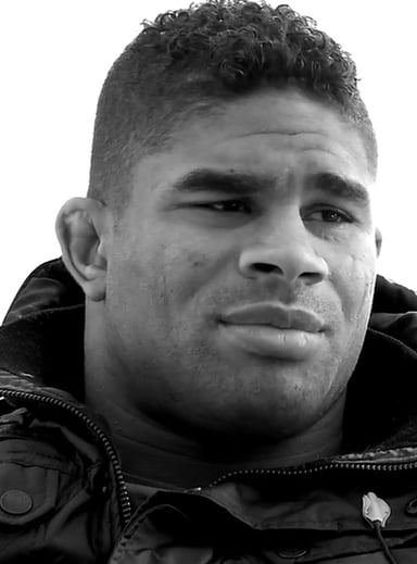 Overeem's fighting style primarily includes Muay Thai and?