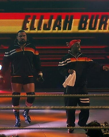 Before becoming a pro-wrestler, what was Elijah Burke's occupation?