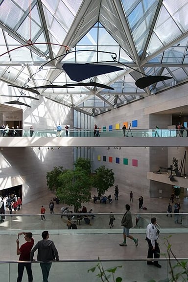 Who donated a substantial art collection and funds for the construction of the National Gallery of Art?