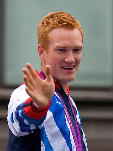 How many times did Greg Rutherford win the British national outdoor long jump title?