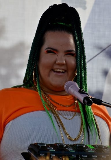 What instrument does Netta famously incorporate into her performances?