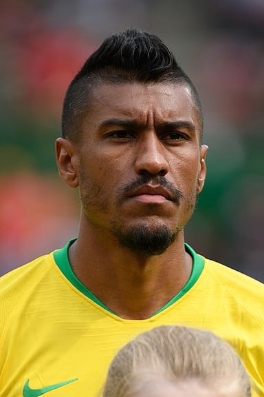 Which year did Paulinho win the Chinese Super League with Guangzhou?