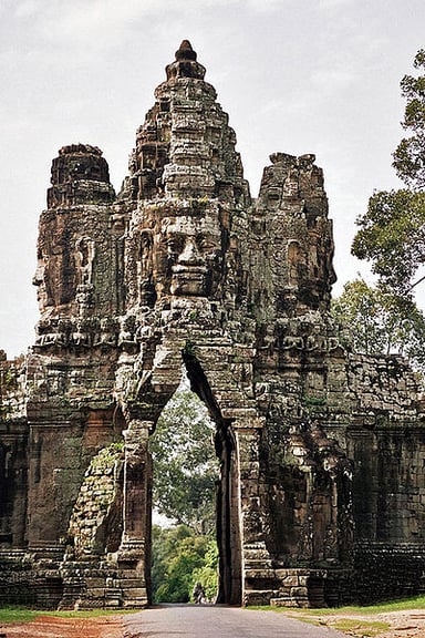 In which year did Angkor fall under Ayutthayan suzerainty?
