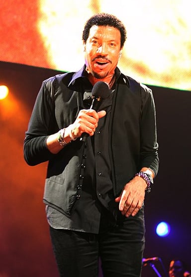 In which year did Lionel Richie take a break from recording?