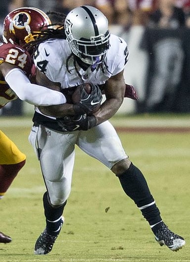 In which University did Marshawn Lynch become the second-all time career rusher?