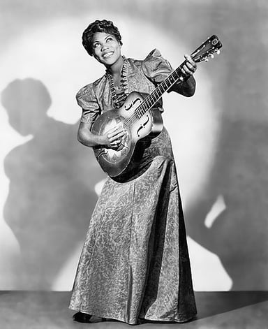 When was Sister Rosetta Tharpe posthumously inducted into the Rock and Roll Hall of Fame?