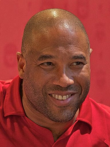 What position did John Barnes primarily play in his early career?