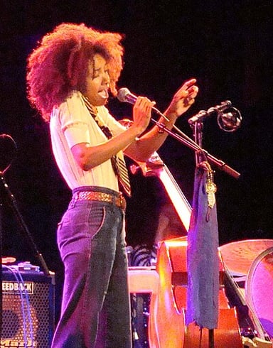 What instrument does Esperanza Spalding notably play?