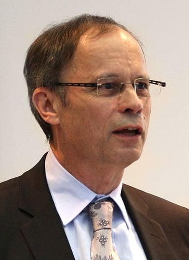 What nationality is Jean Tirole?