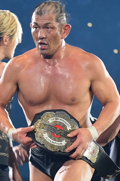 What is Minoru Suzuki known for outside wrestling?