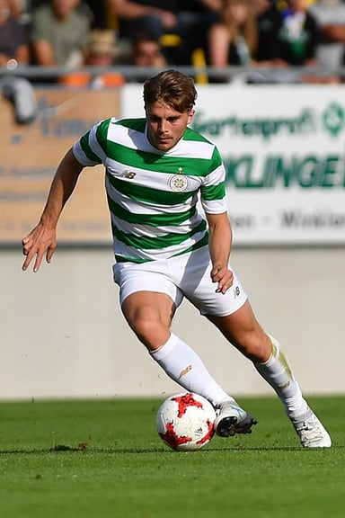 When did James Forrest make his first team debut for Celtic?