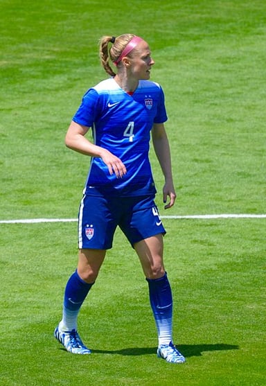 With which teammate did Becky Sauerbrunn co-captain the United States women's national soccer team from 2016 to 2018?