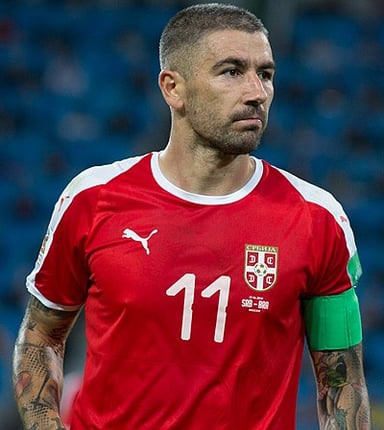 What is Aleksandar Kolarov's primary nationality?