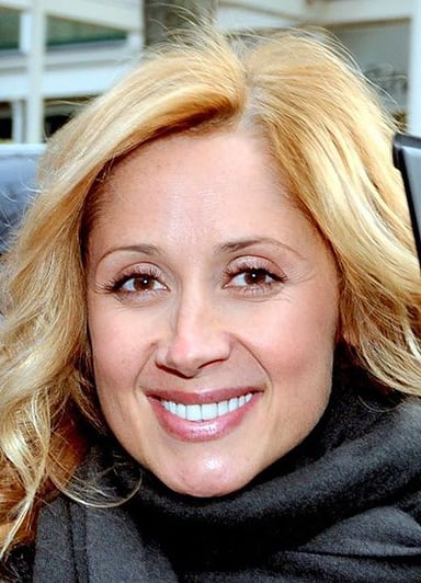 Which part of her life did Lara Fabian spend in Brussels?