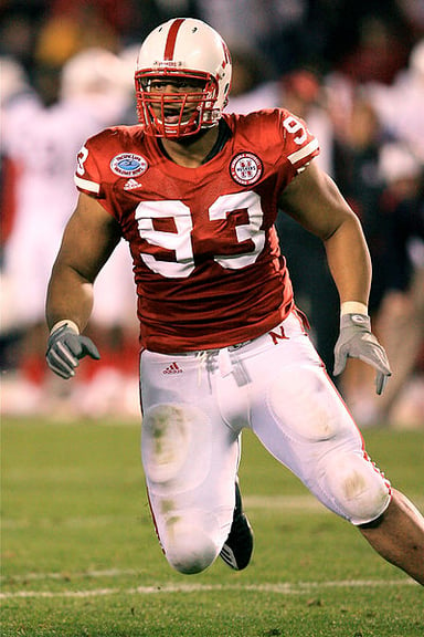 Which award did Suh win during his senior college year?