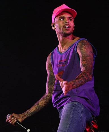 What award did Chris Brown receive in 2011 for [url class="tippy_vc" href="#4158840"]F.A.M.E.[/url]?
