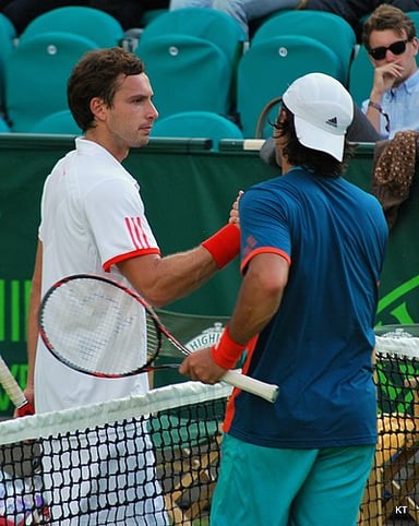 Which former professional Croatian tennis player and Davis Cup captain coached Gulbis?
