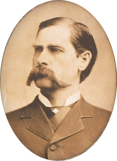 Which group of outlaws did the Earps frequently clash with in Tombstone?