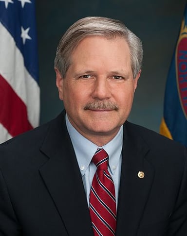 As a banker, Hoeven worked for which state-owned bank?