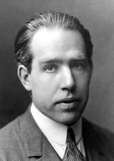 Which element did Niels Bohr predict the existence of, leading to its discovery?