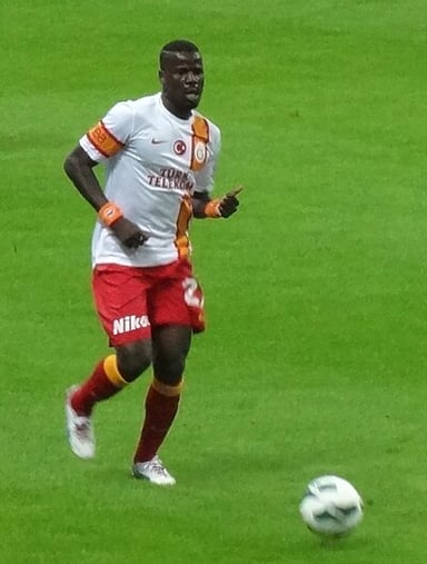 Eboué played in the UEFA Champions League final while with which team?