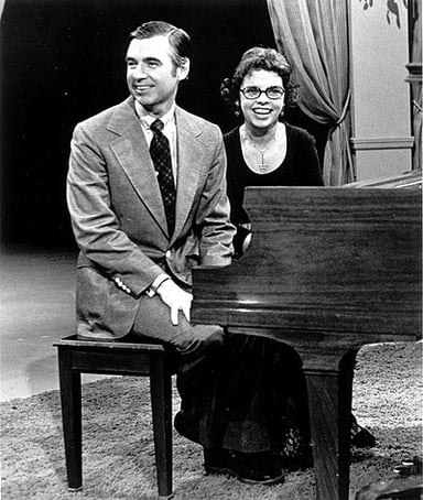 Which instruments does Fred Rogers play?[br](Select 2 answers)