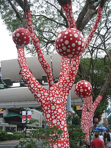 What are the colorful marks that Kusama is known for using?