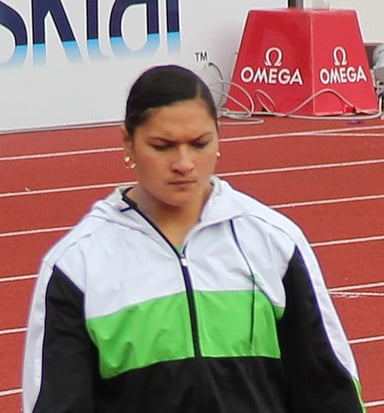What other record does Valerie Adams hold besides Oceanian and Commonwealth records?