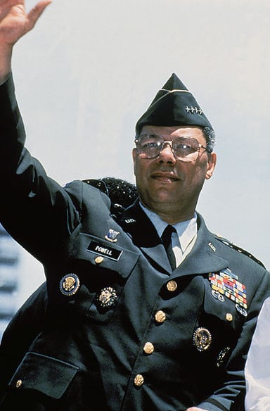 What was Colin Powell's highest military rank?