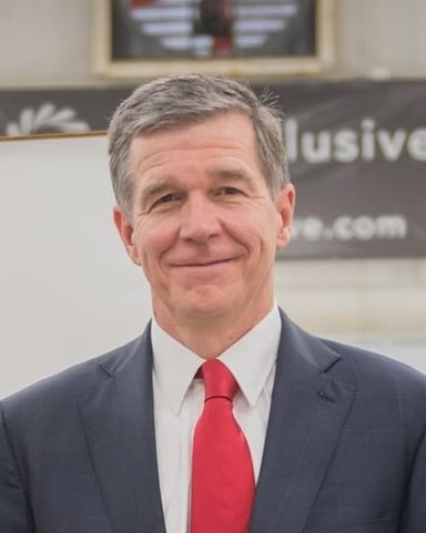 For which county was Roy Cooper once the managing partner for the law firm Fields & Cooper?