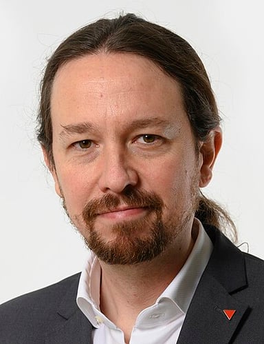 What is Pablo Iglesias Turrión's profession by training?