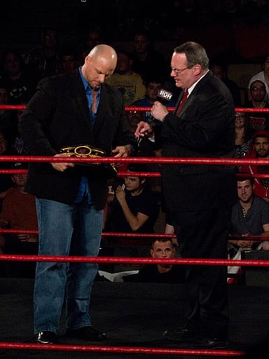 Which wrestling promotion did Jim Cornette serve as an on-screen "authority figure"?